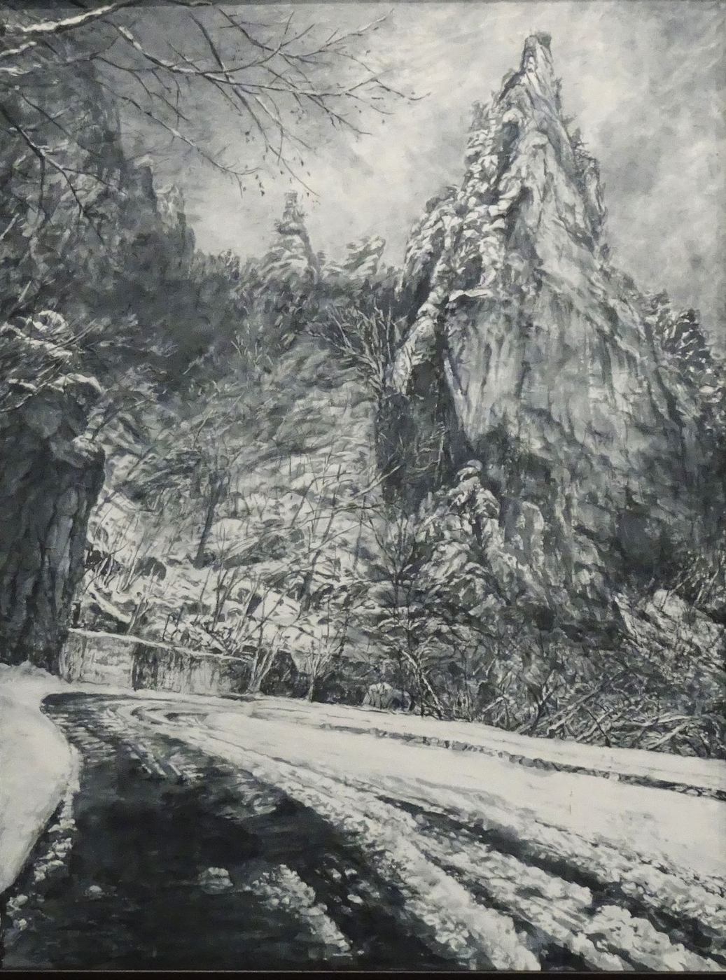 雪に覆われた山々と川を描いた水墨画